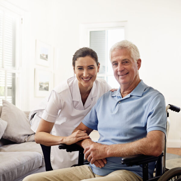 NUrse taking care of a patient on his home